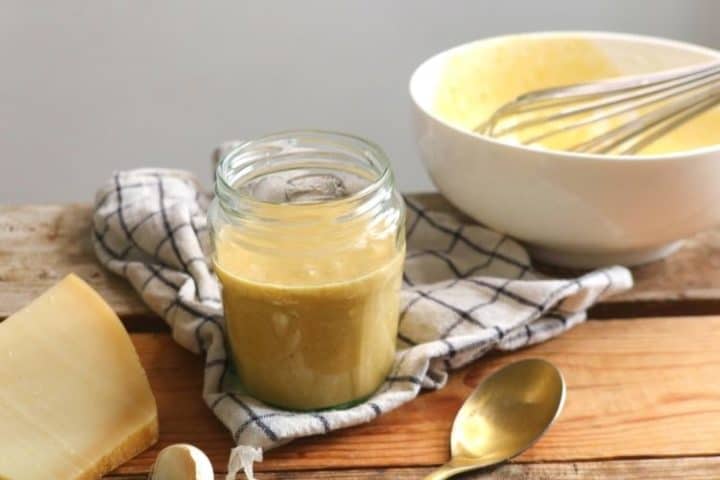 Jar of homemade keto friendly caesar dressing