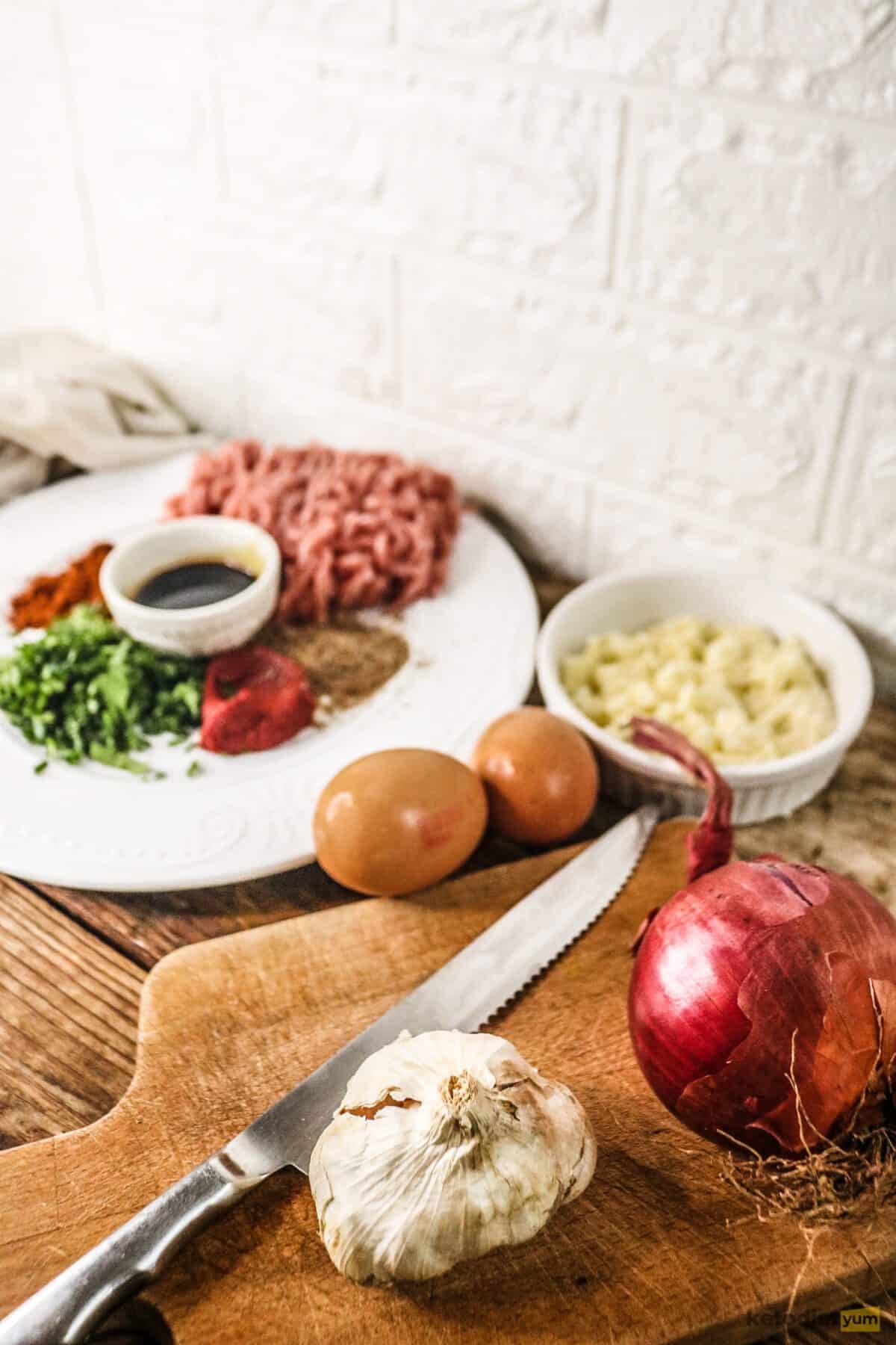 Best Keto Meatloaf Recipe Ingredients for classic keto meatloaf arranged on a table