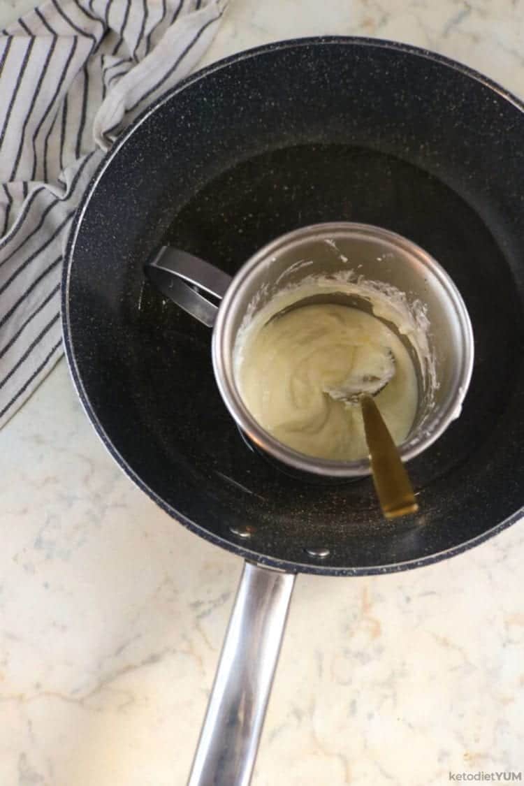 melting the mozzarella for keto cinnamon rolls