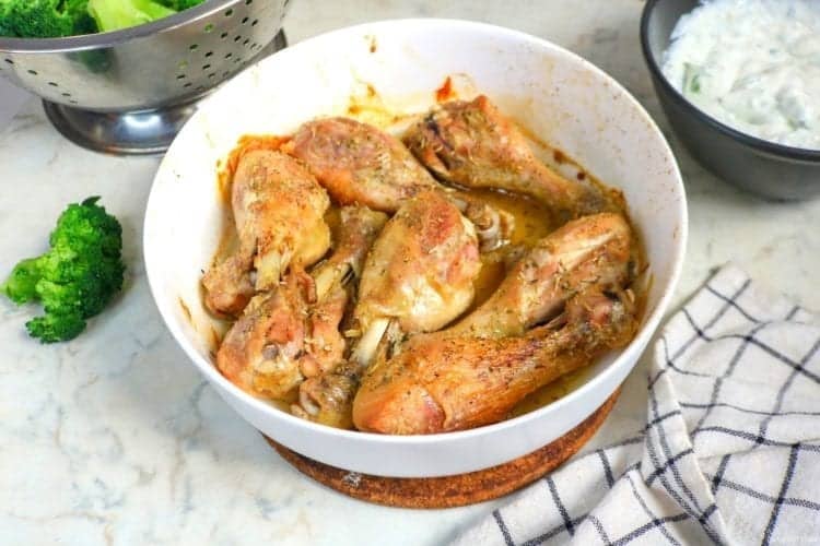 Roast chicken legs seasoned with oregano and thyme
