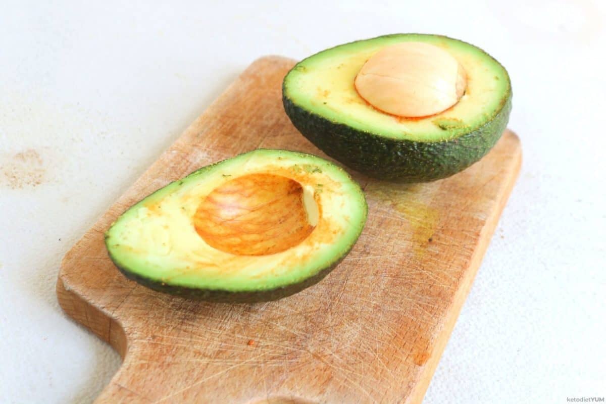 Avocados cut to make avocado egg boats