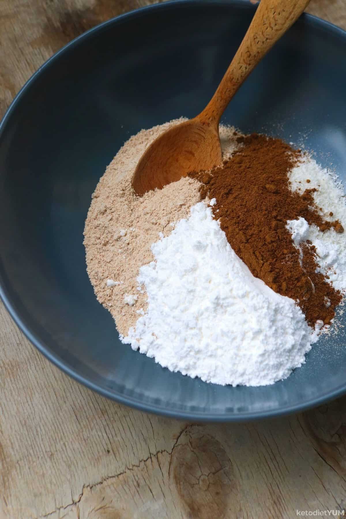 Dry ingredients being combined in a mixing bowl to make cookies