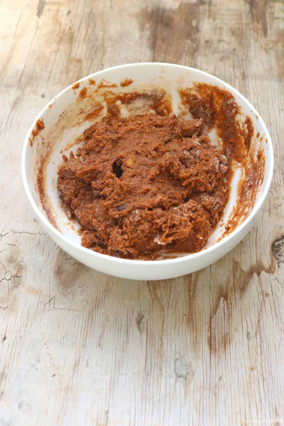 Mixing ingredients in a bowl into a cookie batter