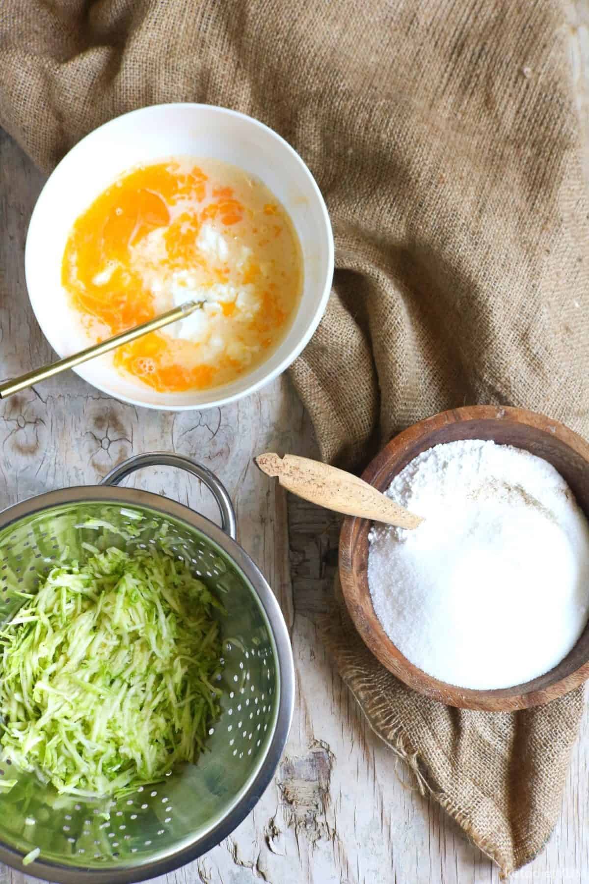 Combining the wet and dry ingredients to make keto zucchini bread