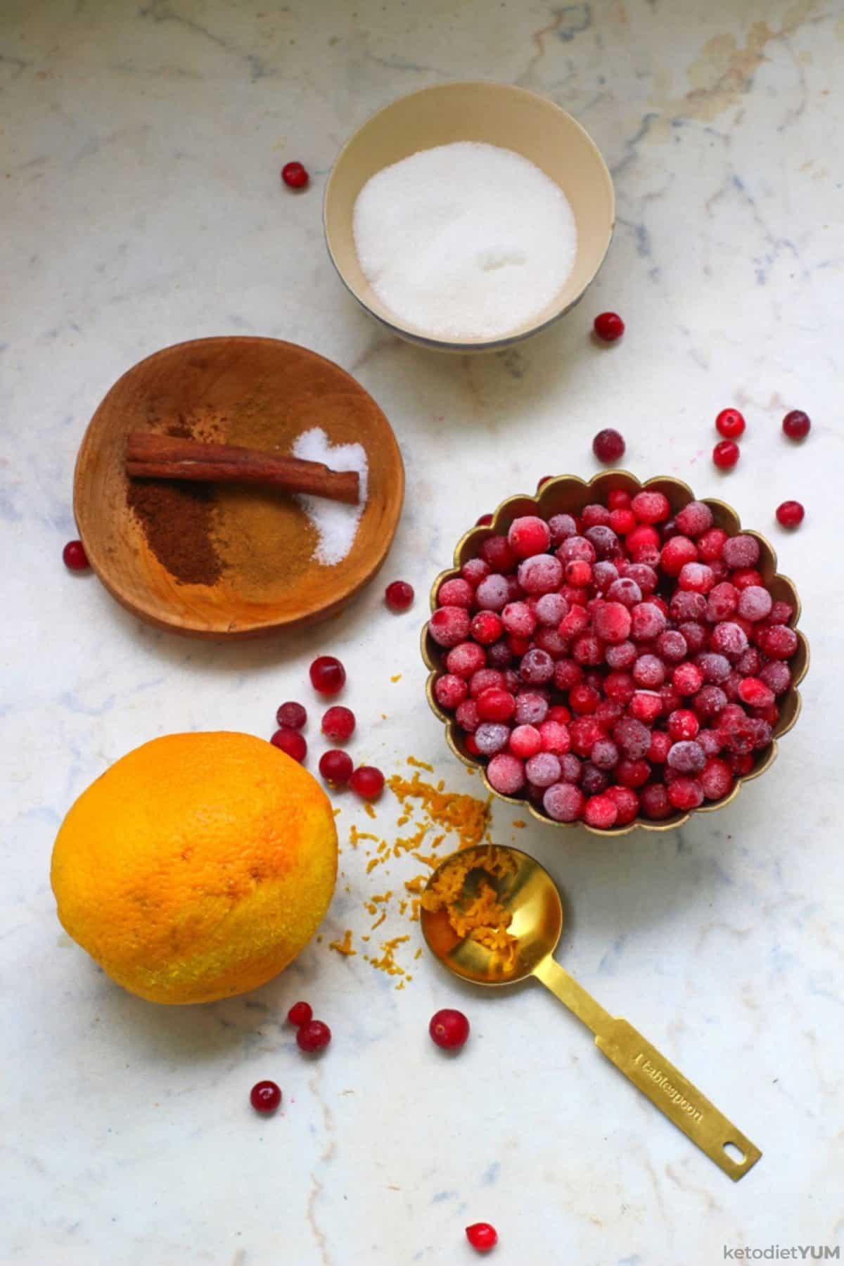 Ingredients displayed on a table to make homemade cranberry sauce