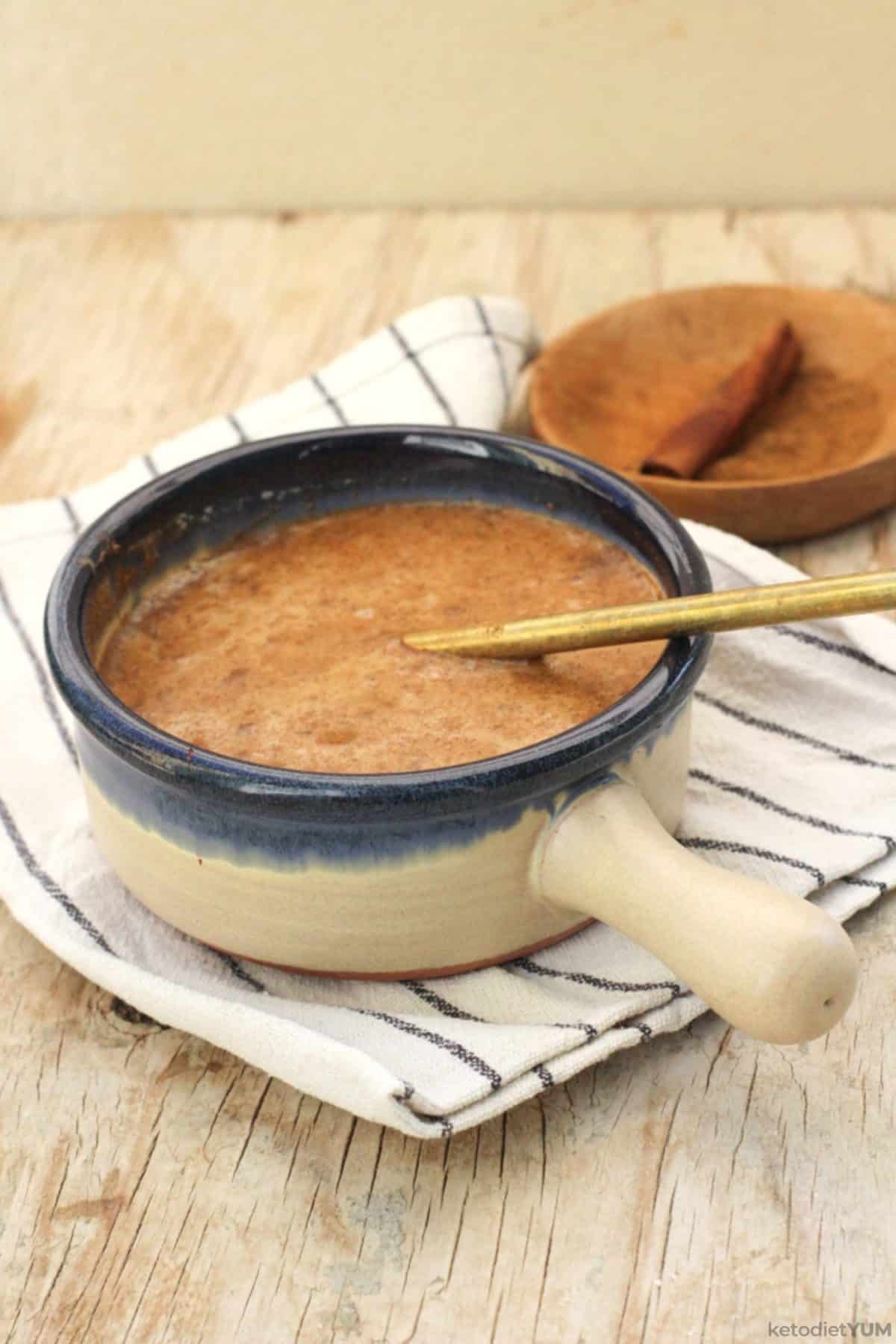 Heating the ingredients with brewed coffee for a pumpkin spice latte