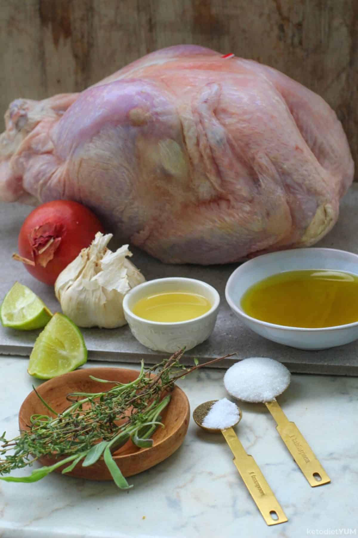 Raw turkey and all the ingredients you'll need to make a delicious Thanksgiving dinner
