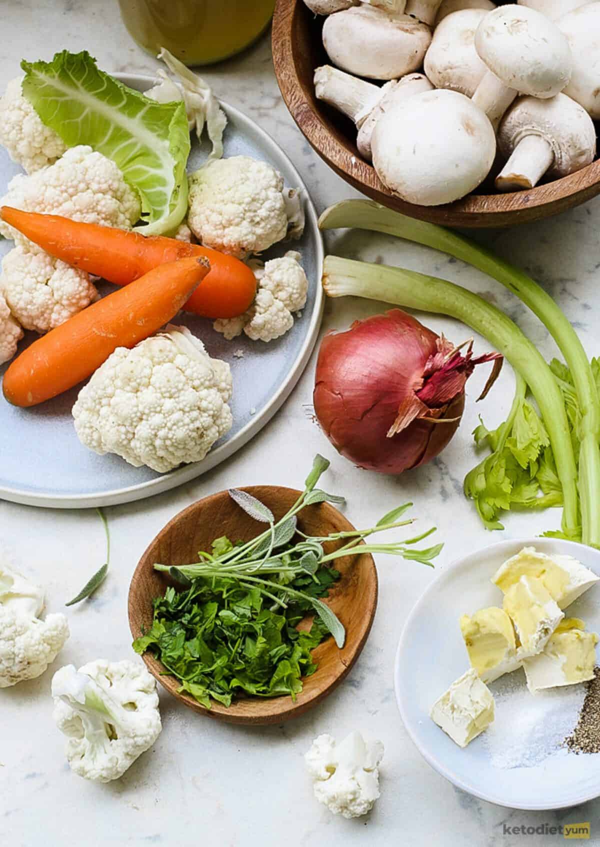Ingredients laid out on a table for low carb cauliflower stuffing