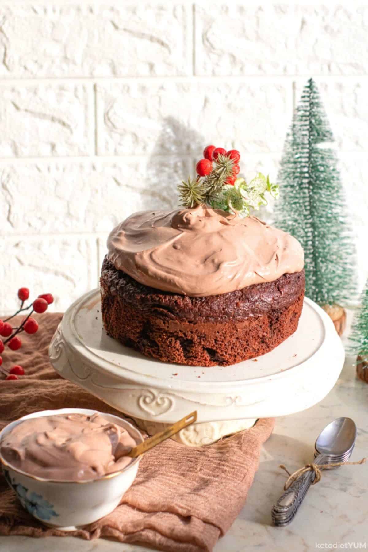 Delicious keto Christmas chocolate cake topped with our low carb chocolate frosting