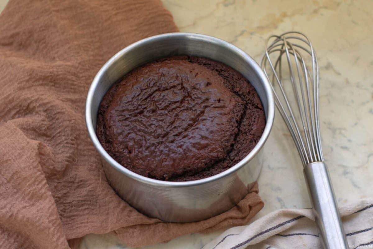 Keto chocolate cake made with almond flour and cacao baked and cooling