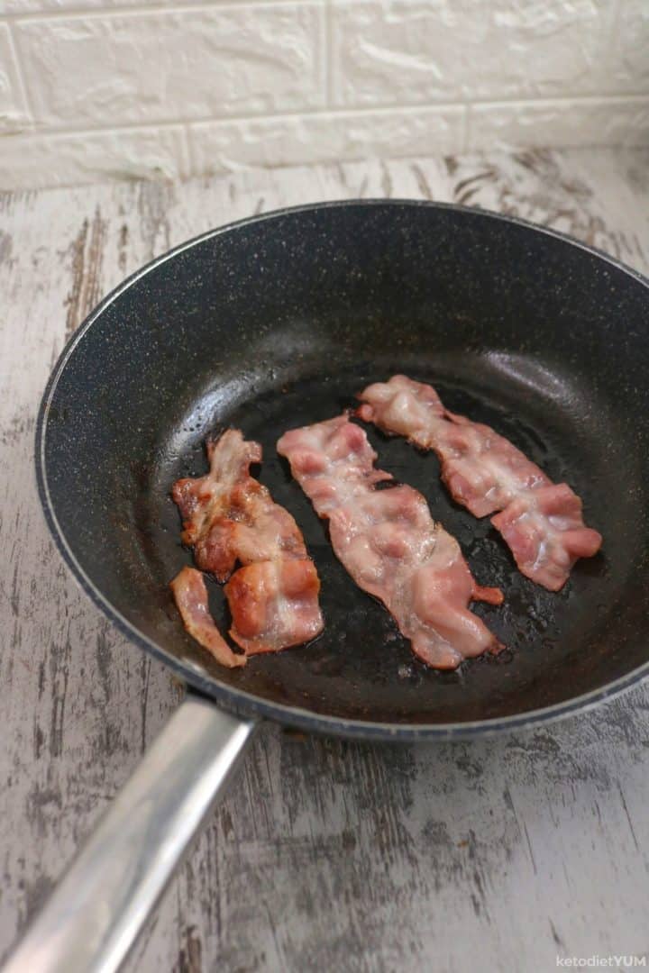 Cooking bacon in a pan until perfectly crispy