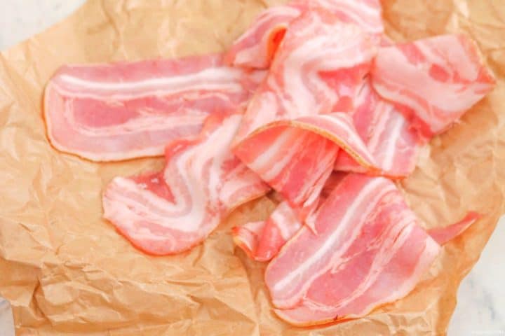 Delicious bacon ready to cook in a pan