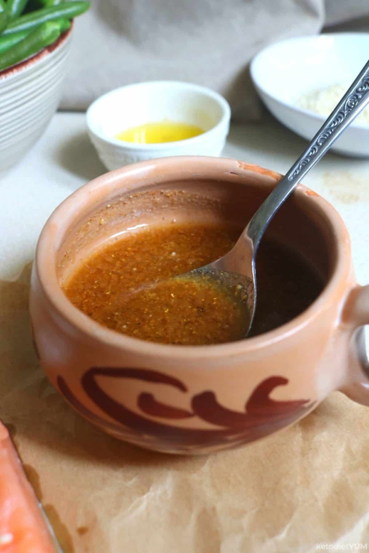 Preparing the glaze with soy sauce, rice vinegar, Erythritol, sesame oil, garlic powder and ground ginger.