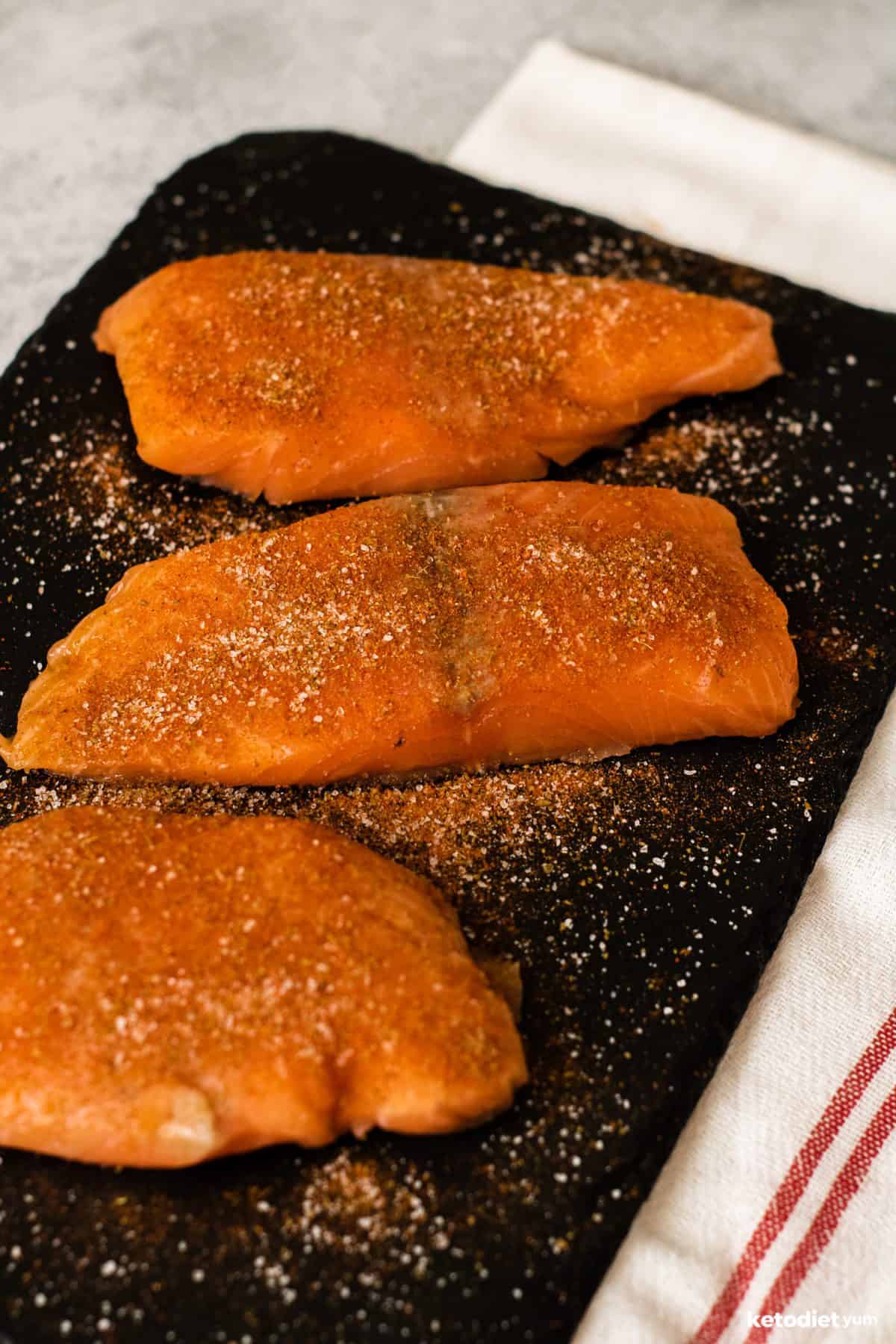 Fresh salmon fillets coated in cumin, chili powder and sea salt