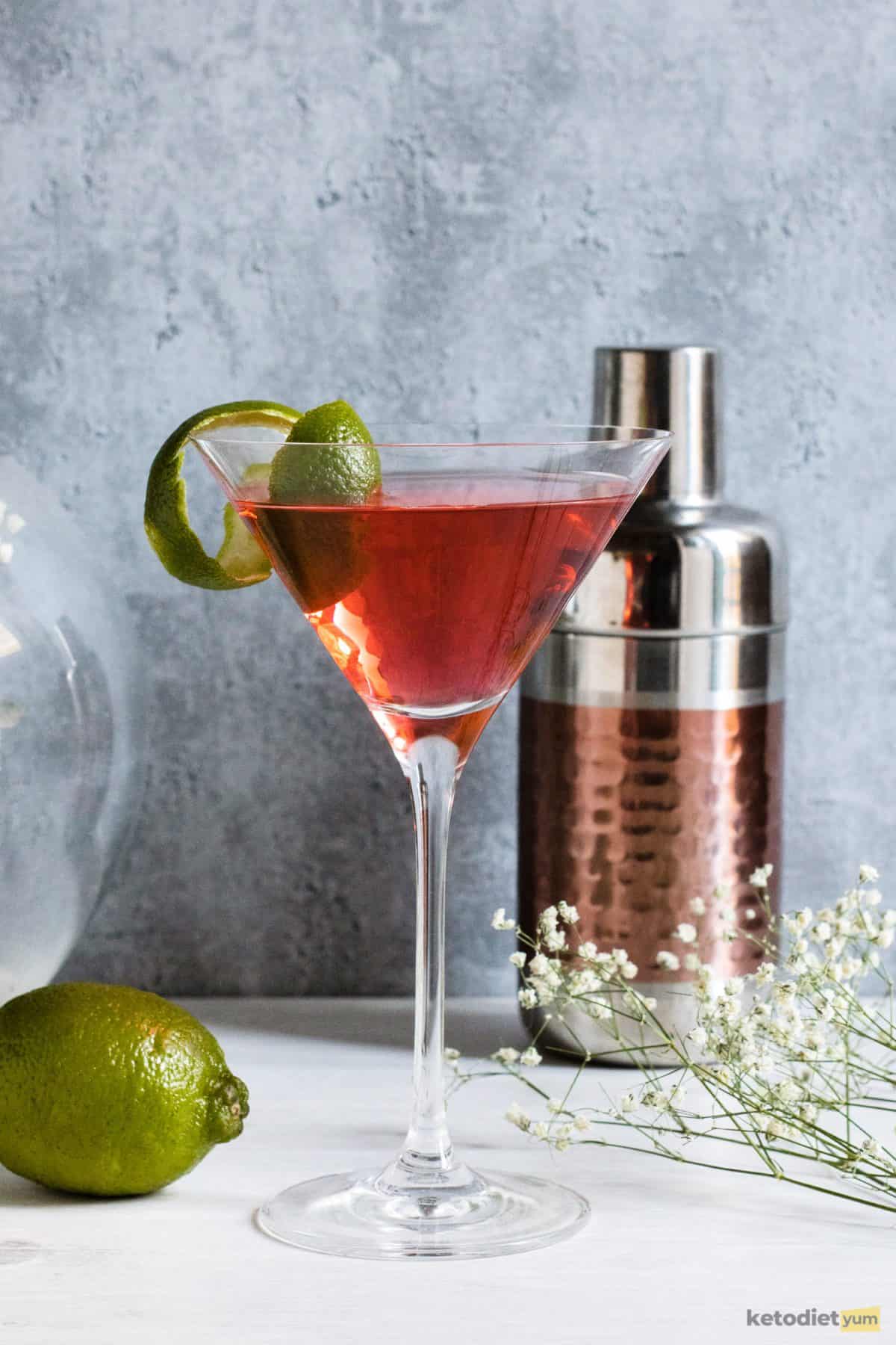 A delicious keto cocktail or low carb cosmopolitan in a martini glass on a table