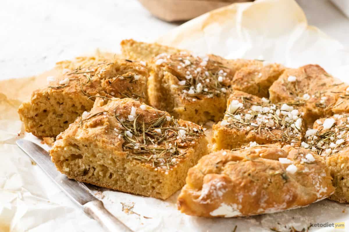 Keto friendly focaccia bread sliced into pieces and ready to enjoy