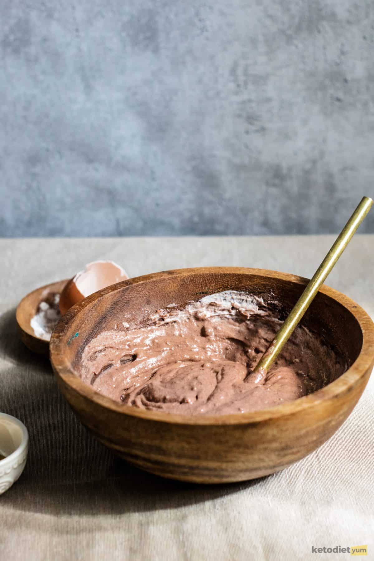 Keto chocolate chaffle batter prepared in a mixing bowl and ready to spoon into a hot waffle iron