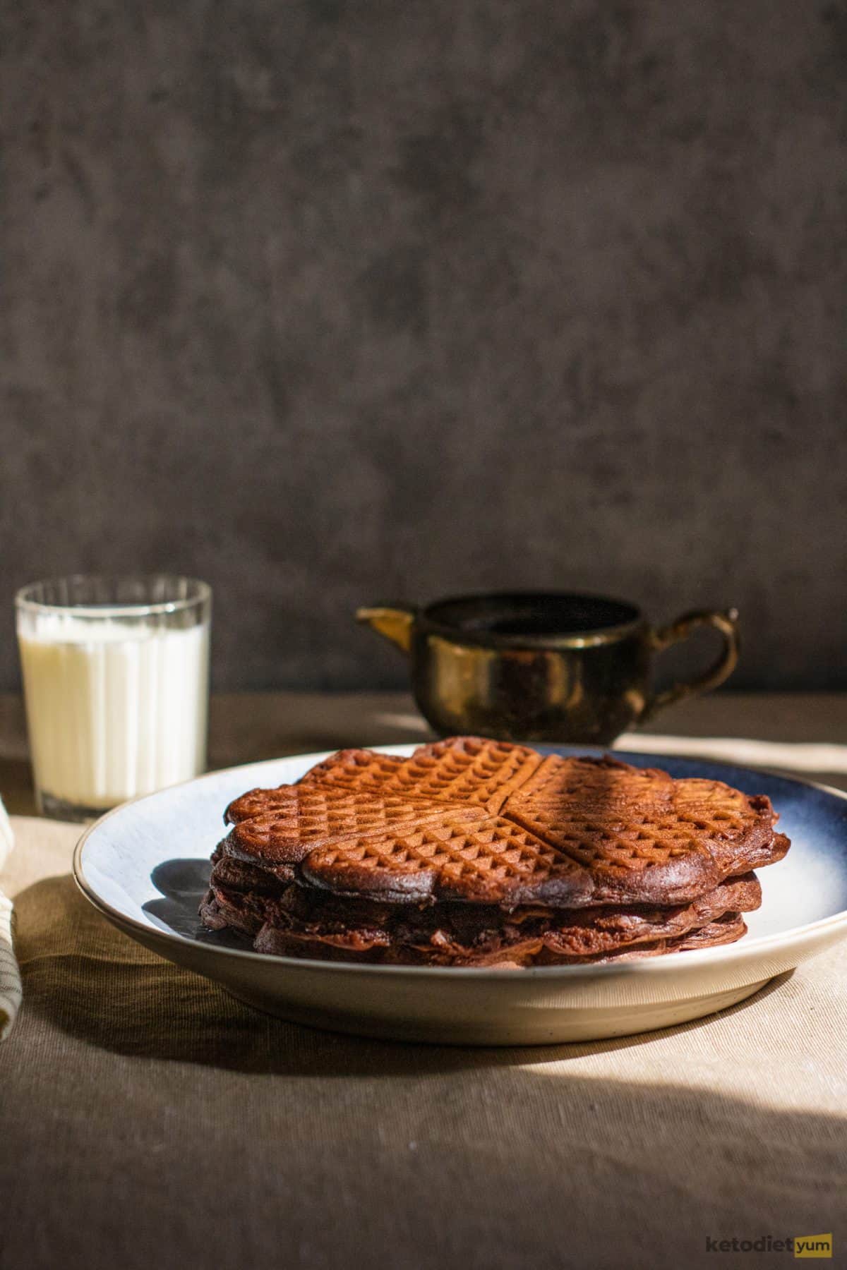 A stack of plain chocolate chaffles that are super low in carbs