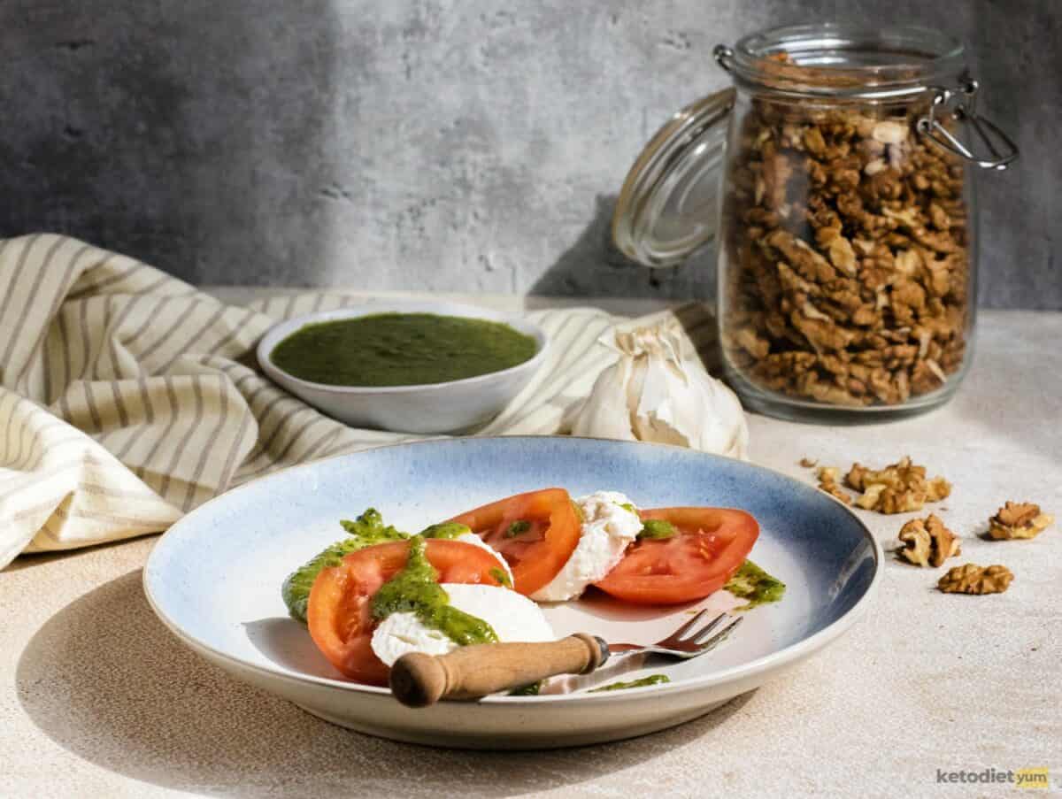 Fresh tomatoes and mozzarella topped with a homemade pesto to complete the caprese salad