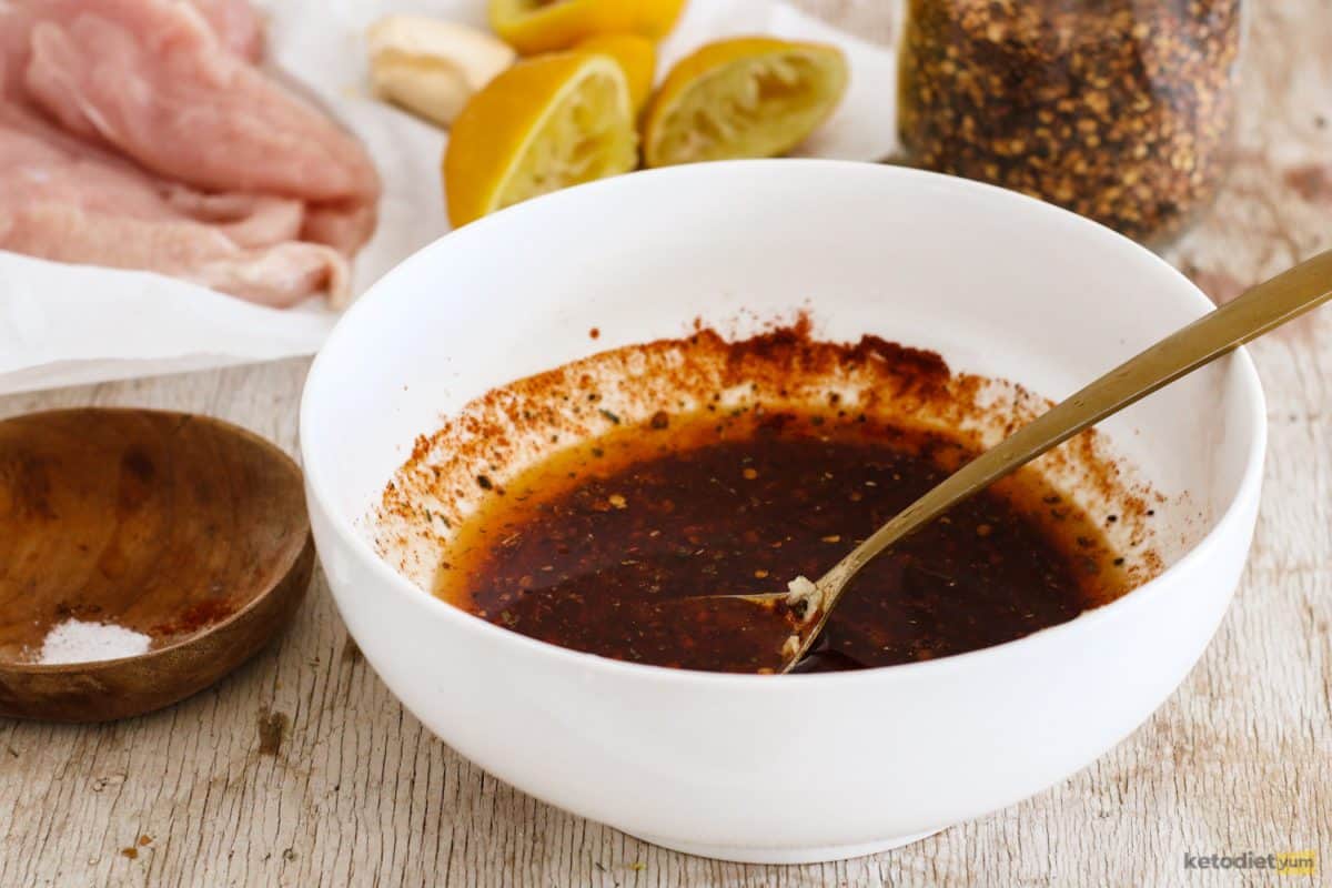 Mixing together ingredients for a homemade peri peri marinade