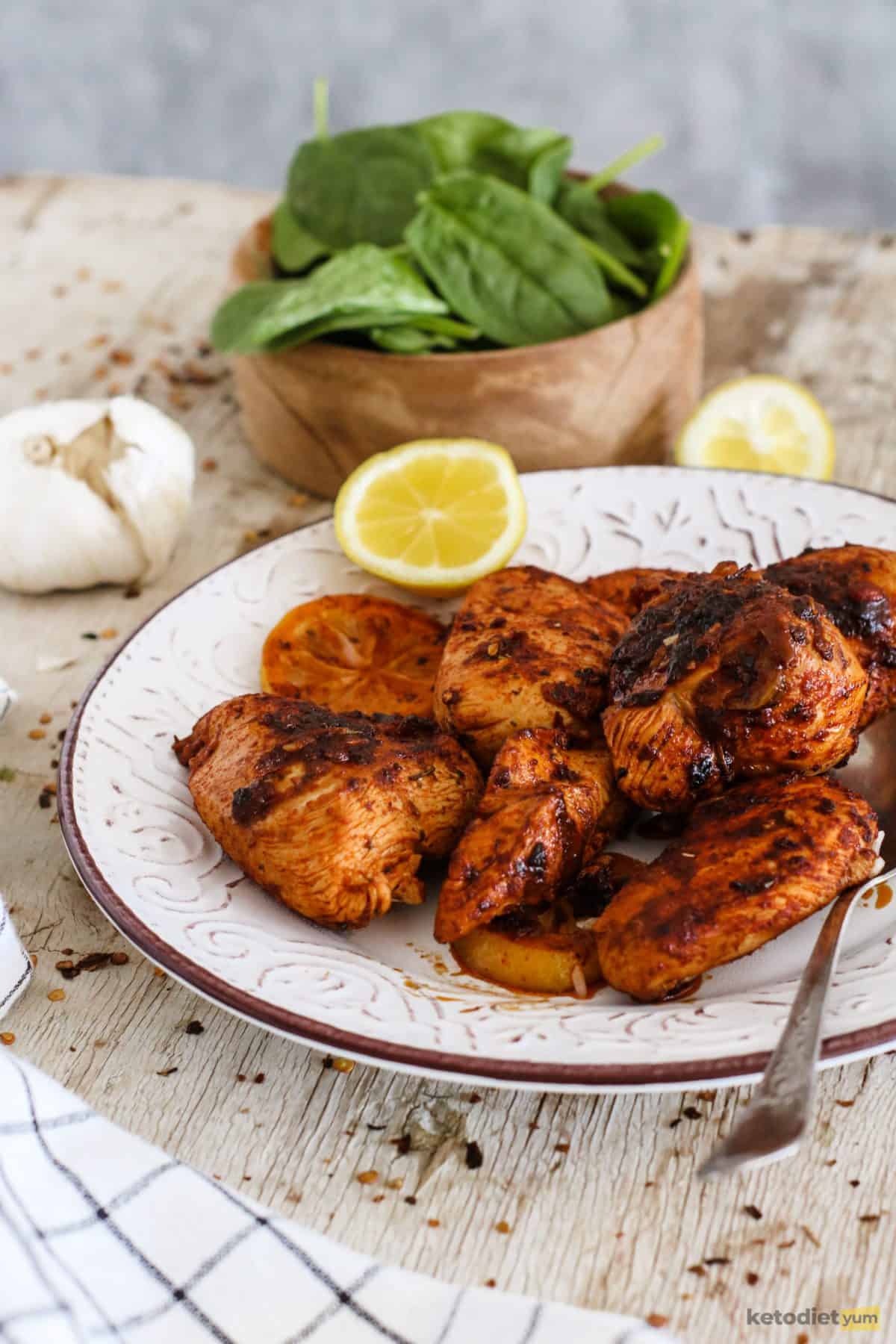 Perfectly charred peri peri chicken breasts that are tender and juicy