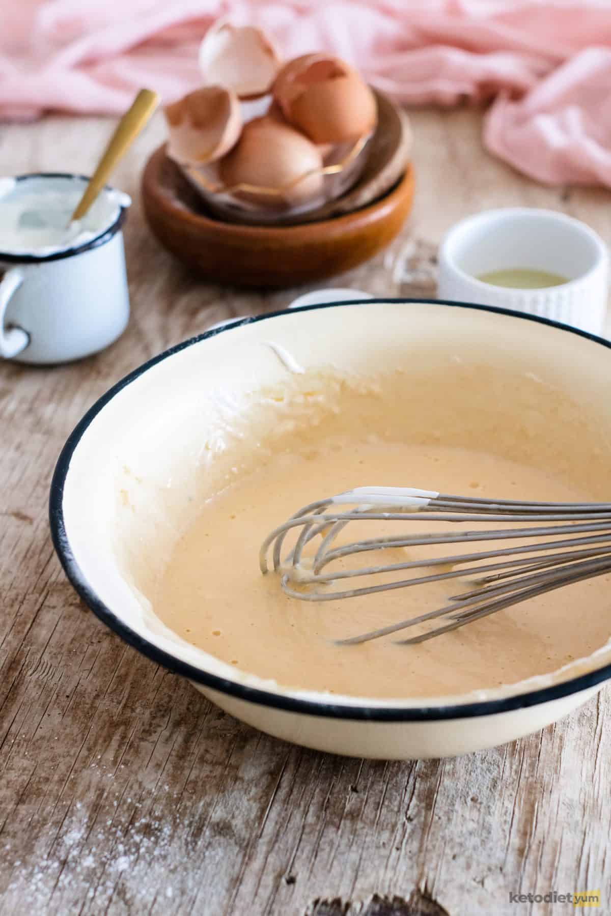 Preparing low carb pancake batter in a bowl