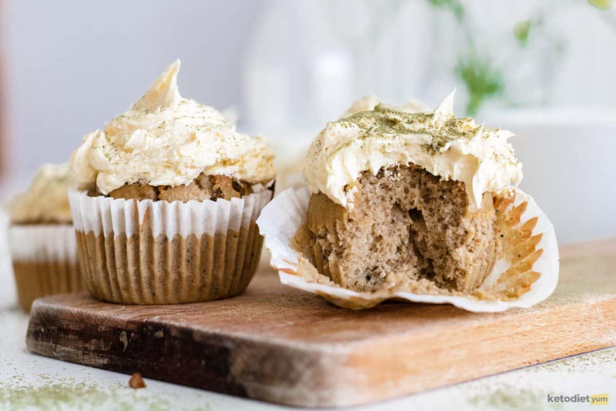 Delicious matcha tea cupcakes with buttercream frosting sprinkled with matcha tea powder