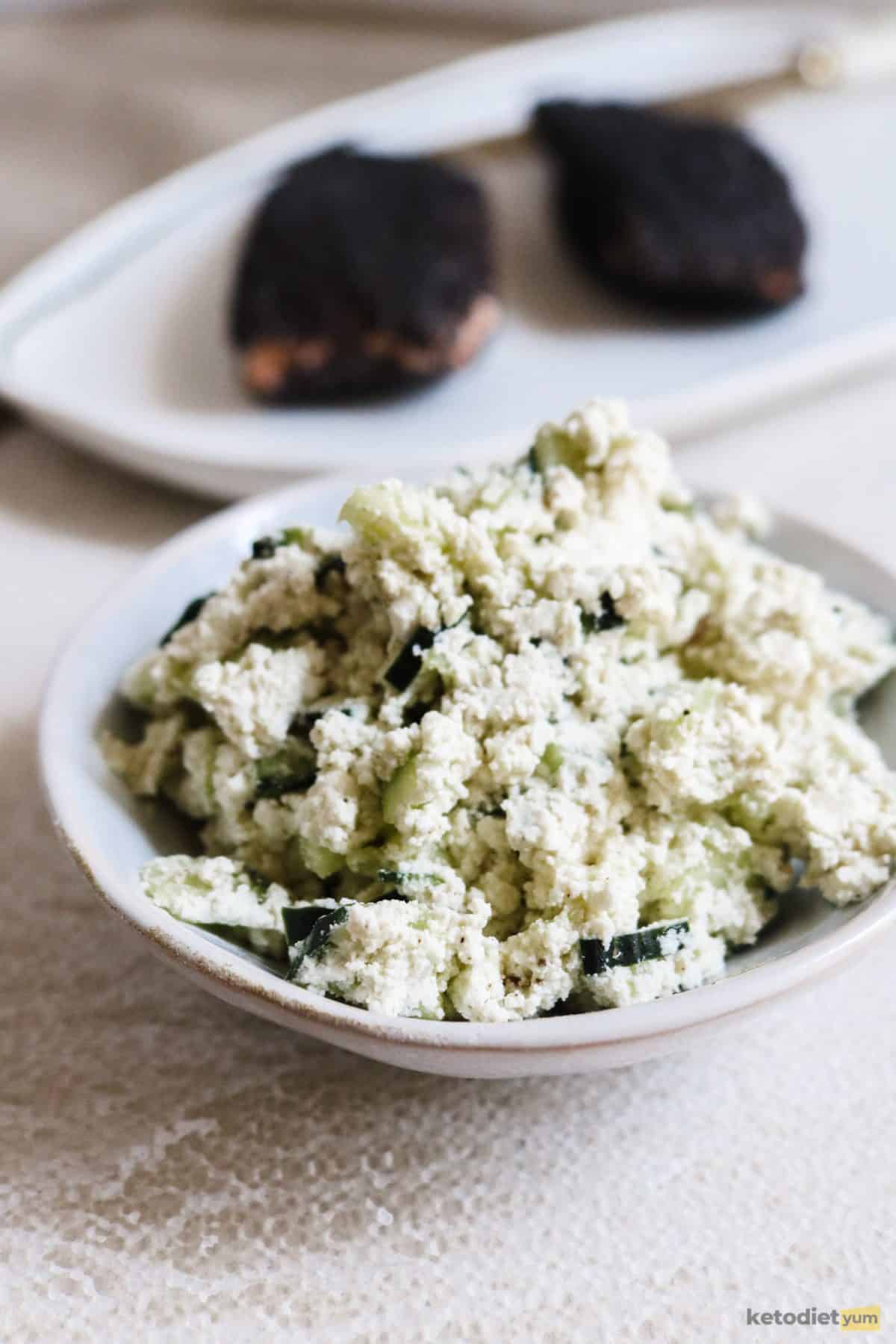A simple and refreshing goat cheese dip made with goat cheese, cucumber, olive oil and seasoned with salt and pepper