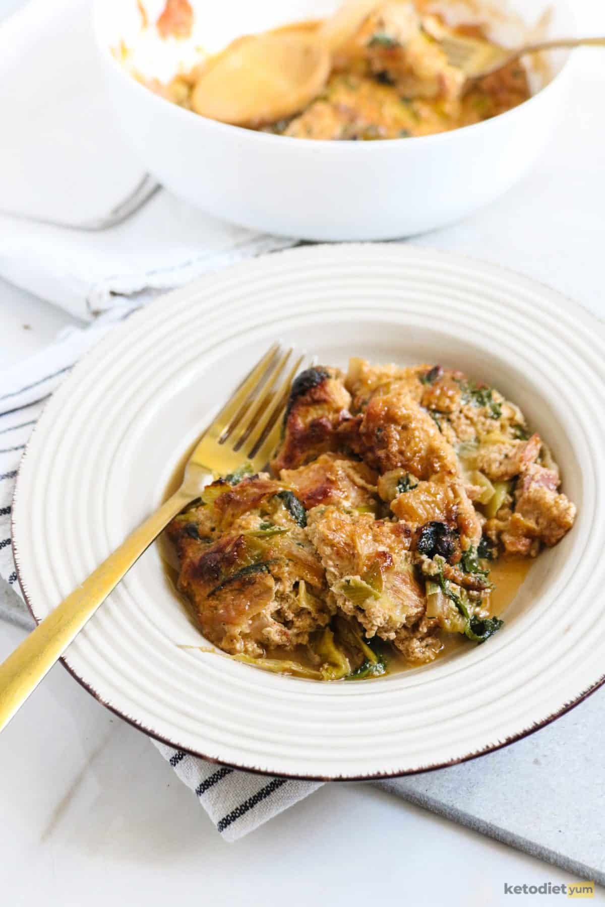 A delicious low carb keto casserole made with chicken, bacon, onions, leeks and spinach