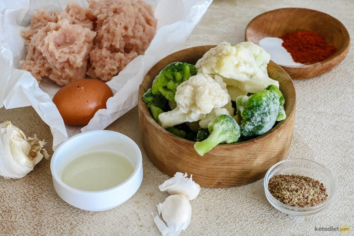 Ingredients arranged on a table to make keto chicken meatballs