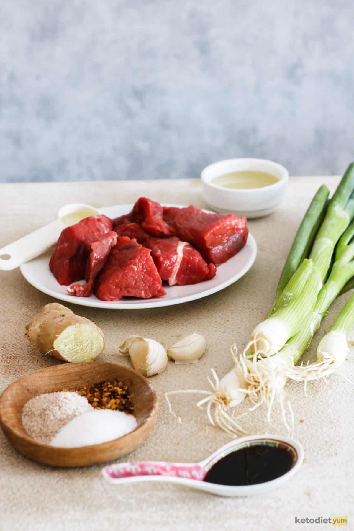 Ingredients arranged on a table to make low carb Mongolian beef