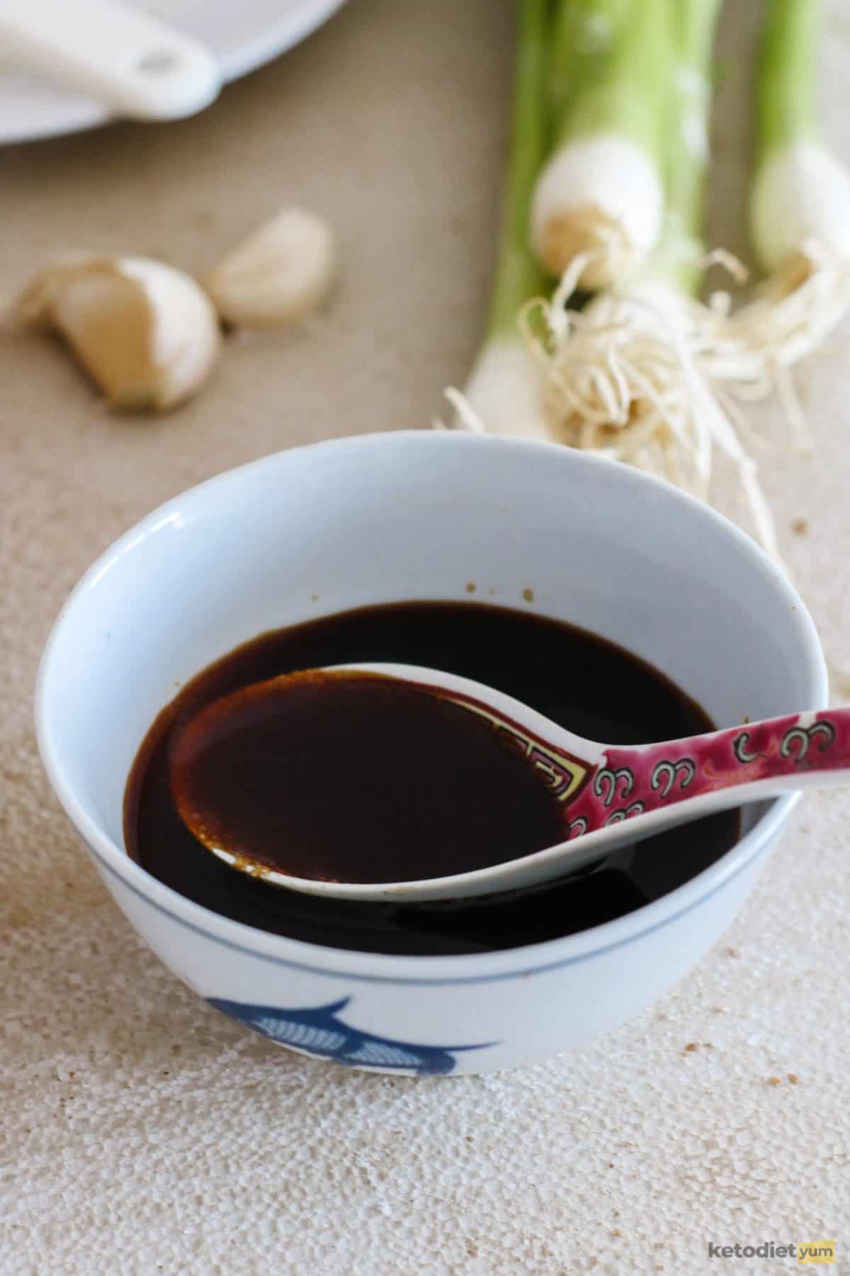 Erythritol and soy sauce combined in a mixing bowl