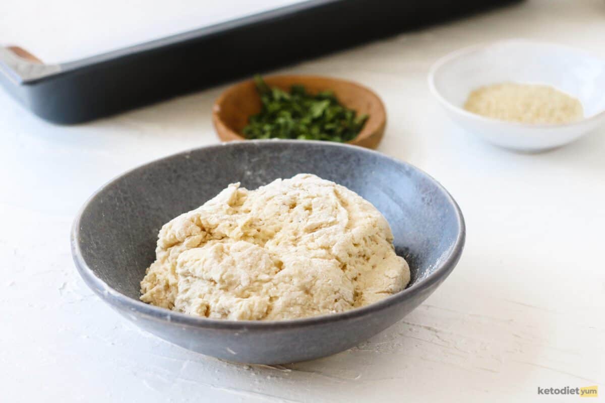 Keto naan bread dough in a mixing bowl ready to roll into flatbreads and bake