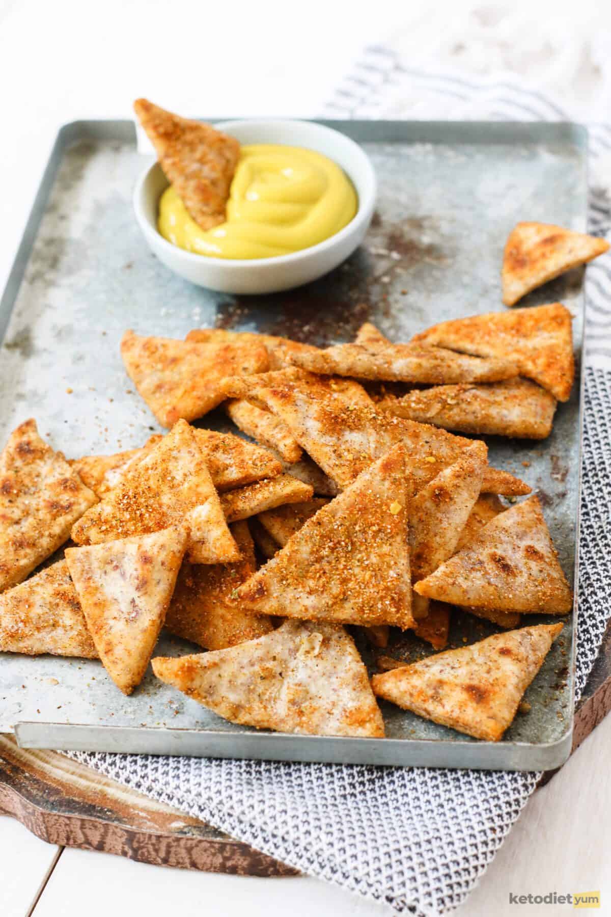 Delicious and healthy low-carb keto Doritos seasoned with powdered ranch, smoked paprika, garlic powder, onion powder and salt