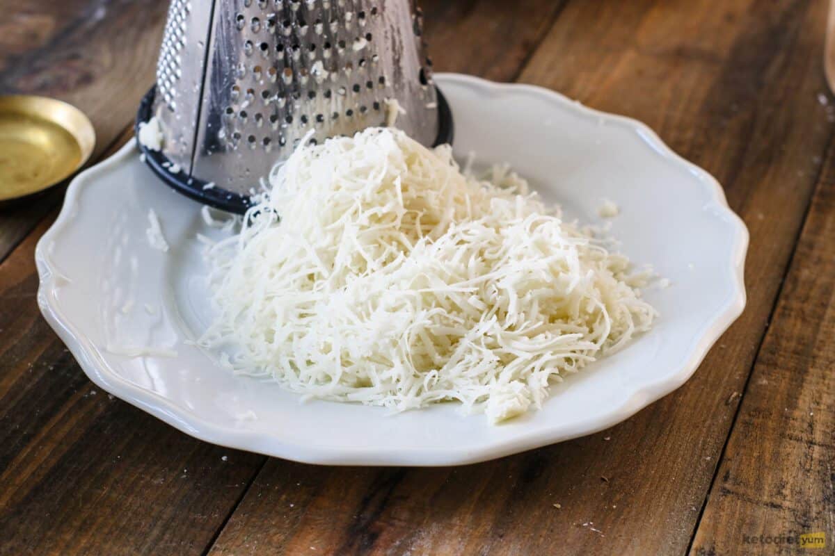 Grated Ayrshire Dunlop cheese on a plate used in traditional Scotch eggs