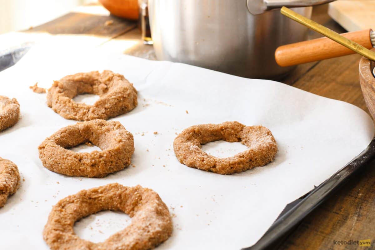 Donuts on a lined baking pan