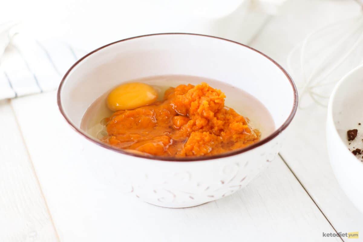 Wet ingredients in a white bowl on a table