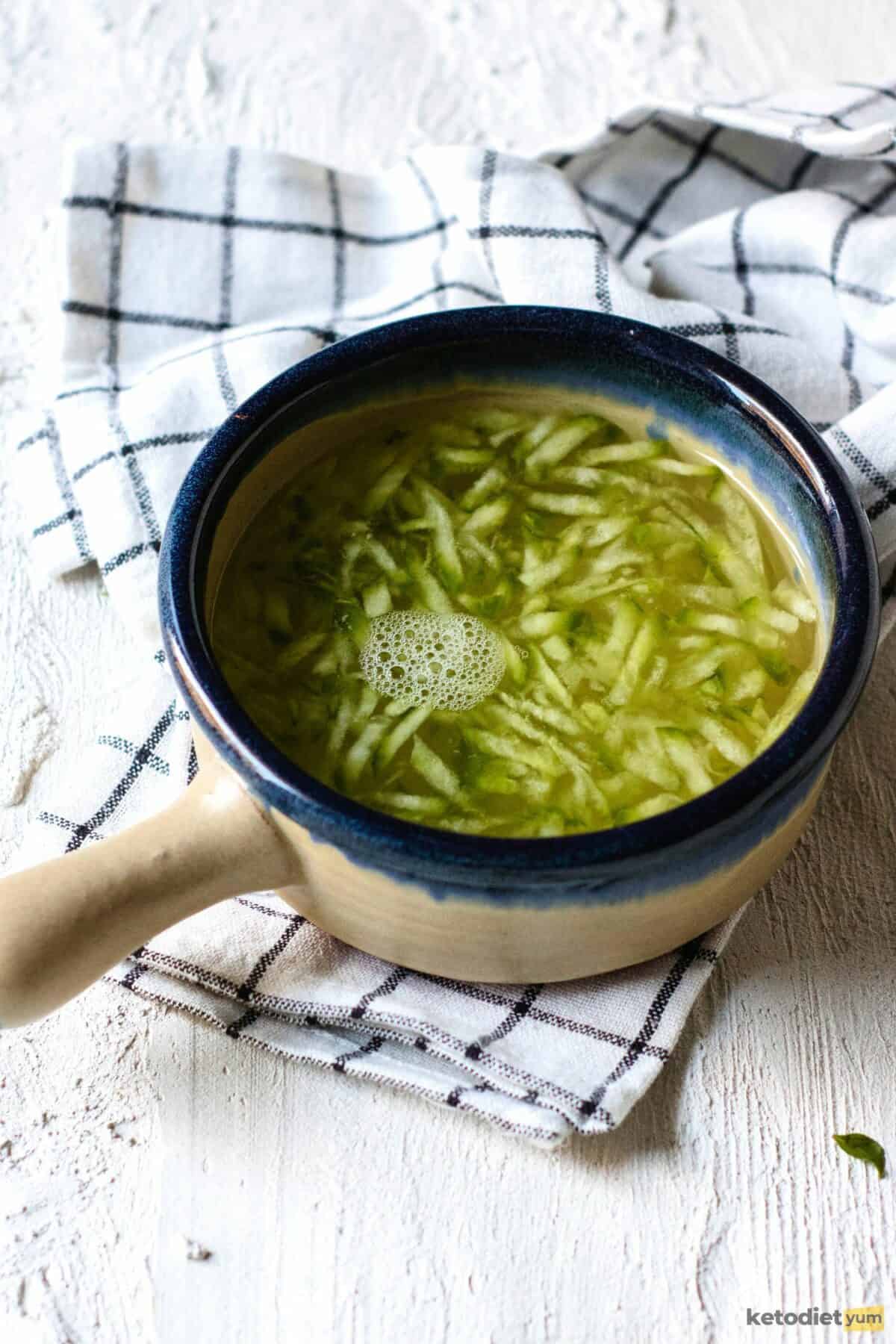 elderflower gin cocktail - grated cucumber boiled with elderflower liqueur to make elderflower syrup