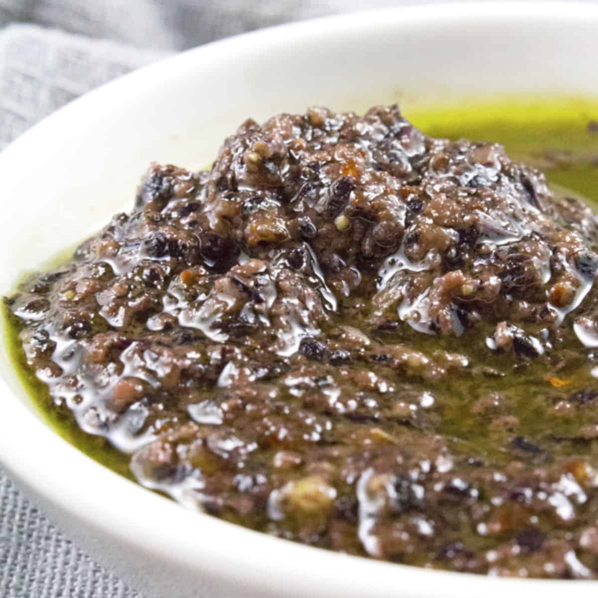 purple basil pesto in a bowl