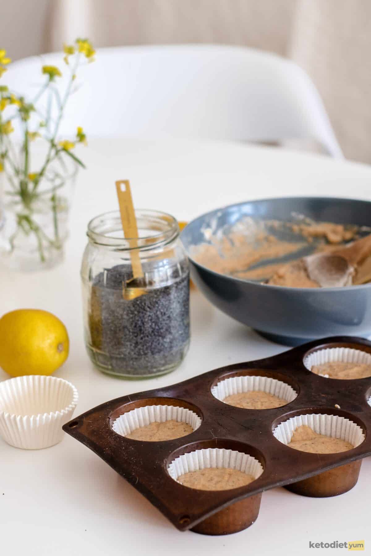 lemon poppy seed cupcakes - pouring batter into lined muffin tray