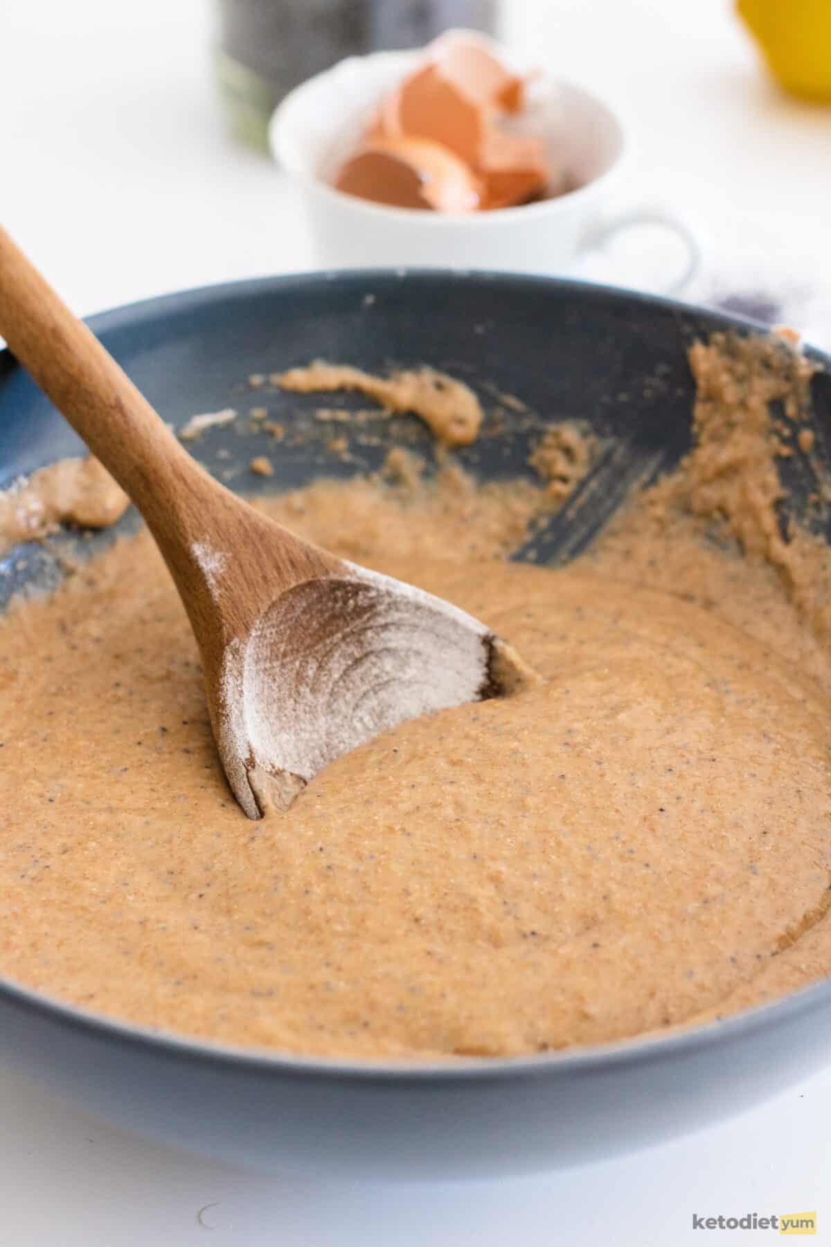 lemon poppy seed cupcakes - mixing wet  and dry ingredients into batter