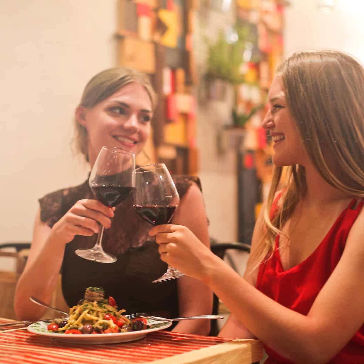 women drinking wine