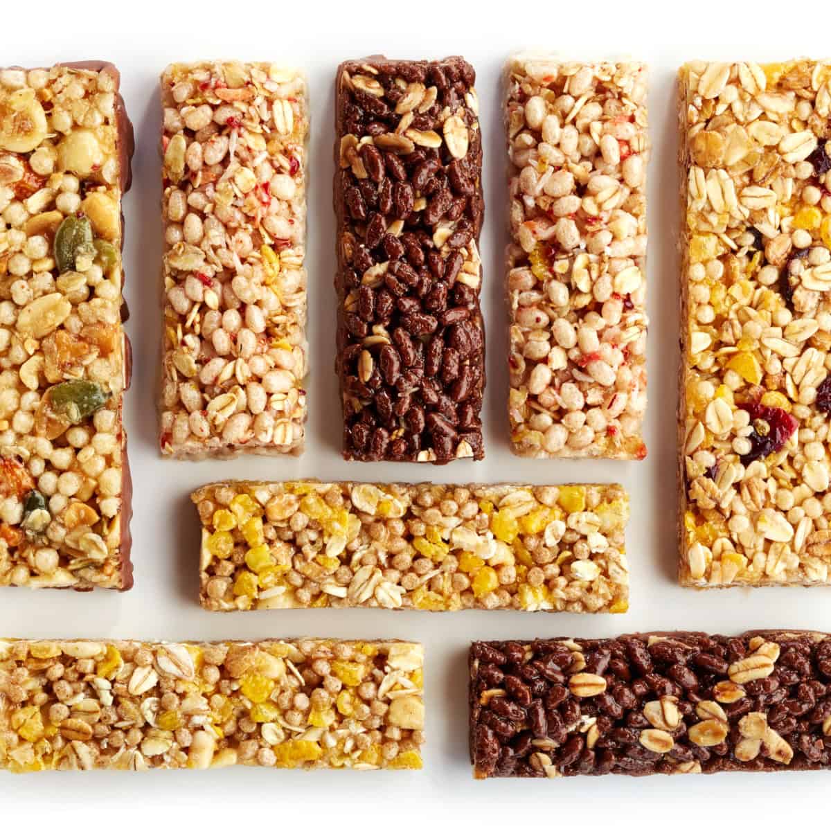different types of high sugar snack bars on a table